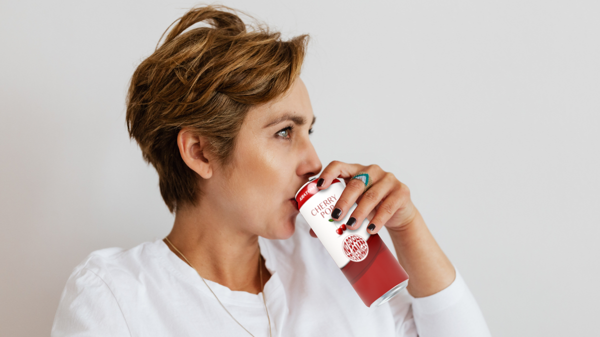 Women relaxing drinking a cherry pop kratom soda